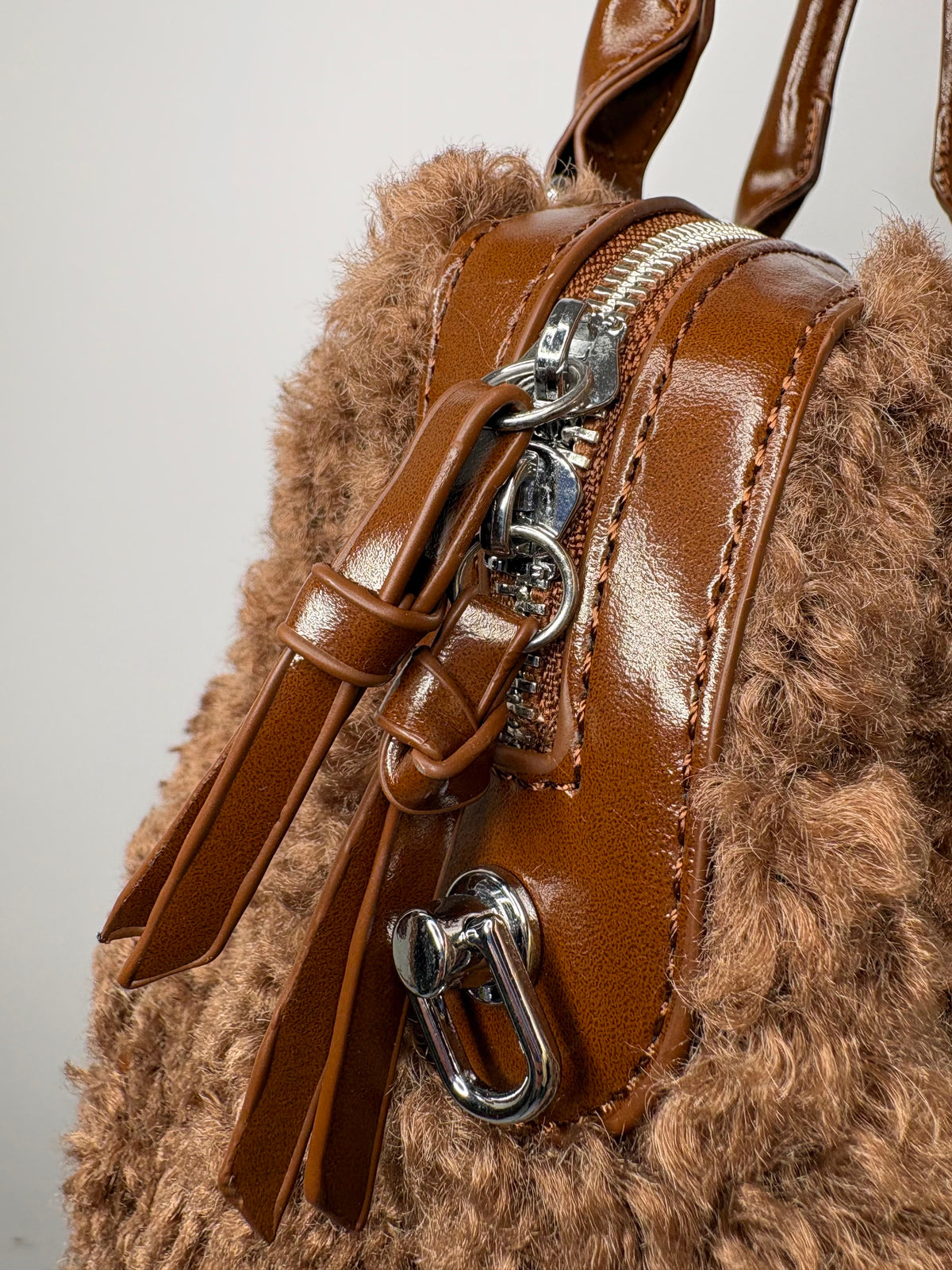 bauletto pelliccia riccia