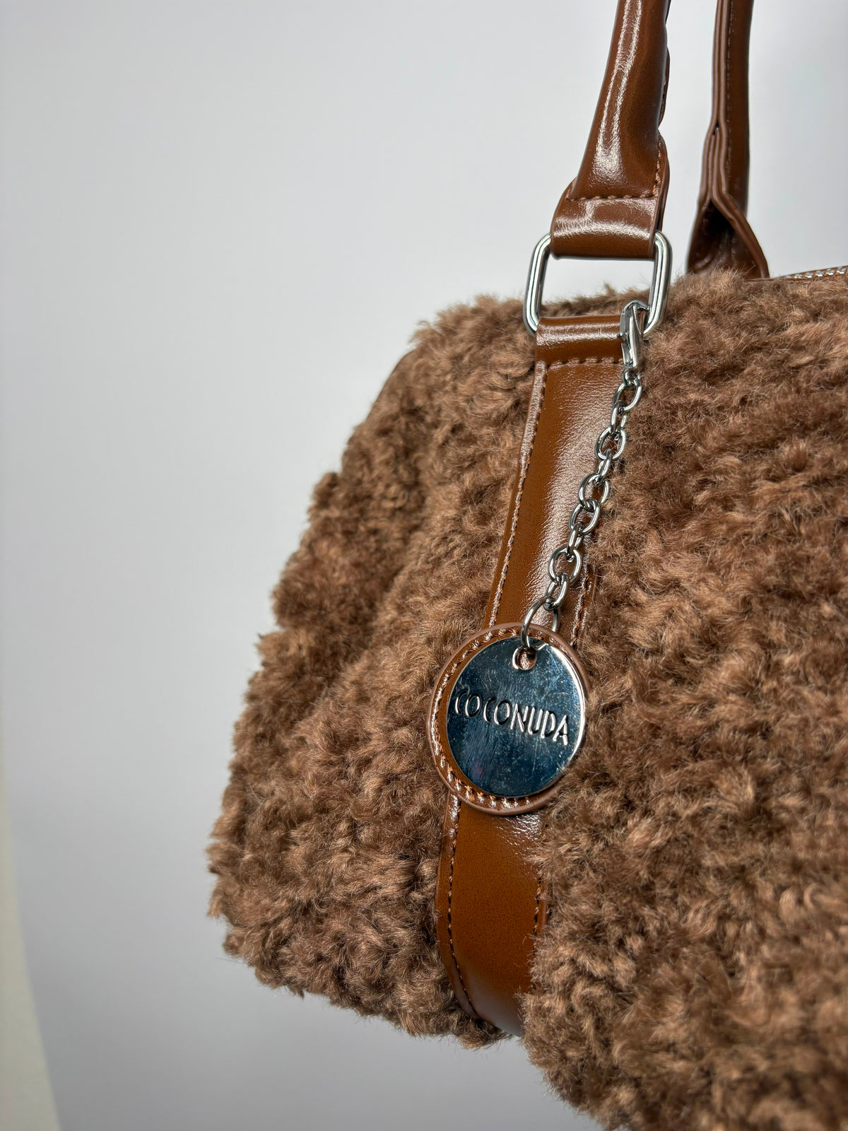 bauletto pelliccia riccia
